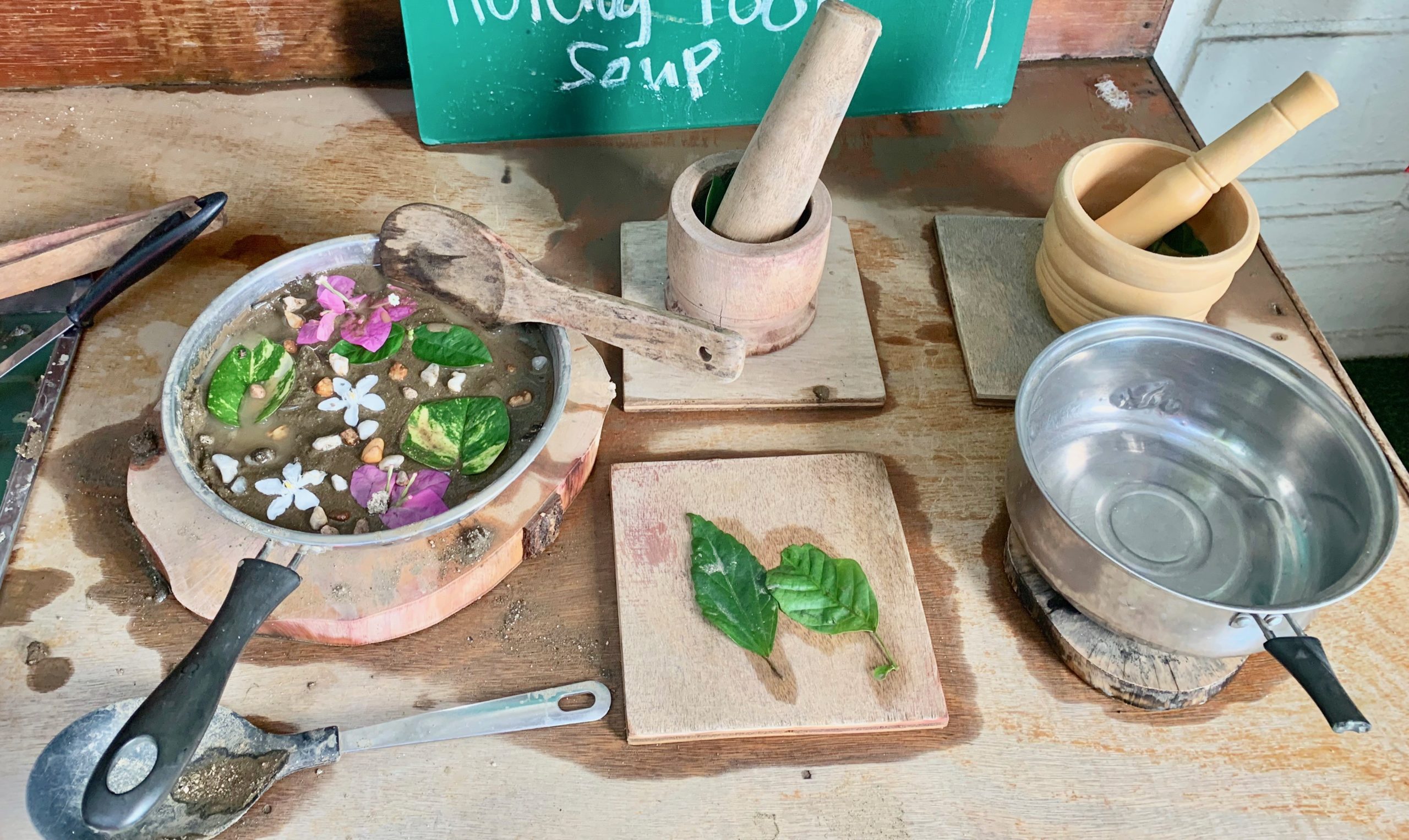 mortar and pestles in mud kitchen